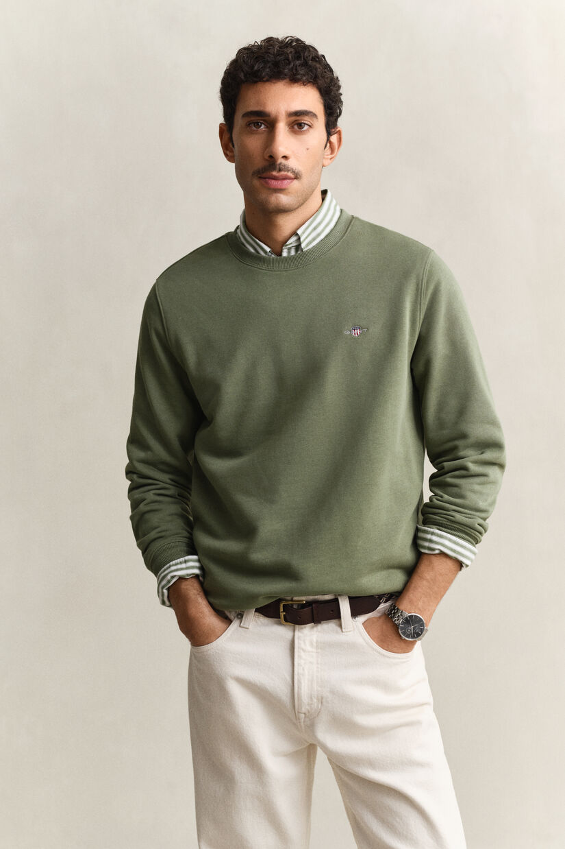Sweat-shirt col rond avec &eacute;cusson