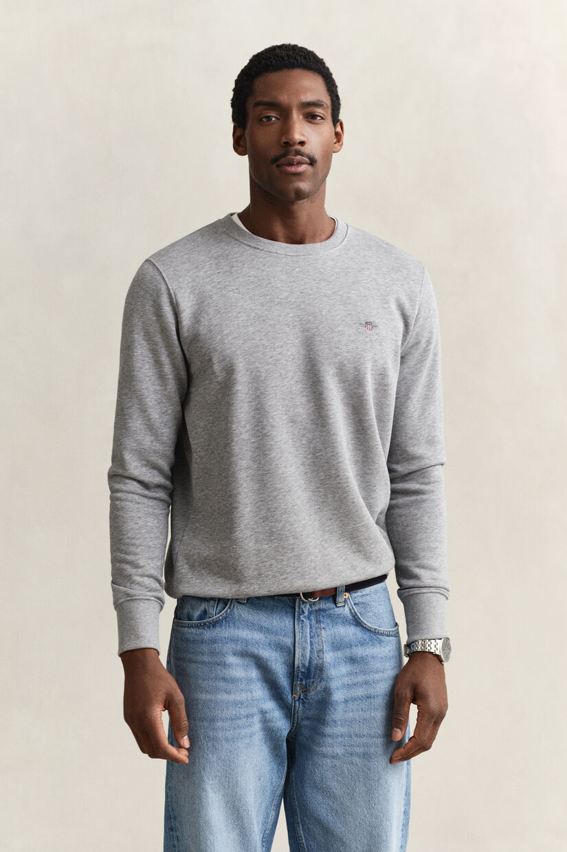 Sweat-shirt col rond avec &eacute;cusson