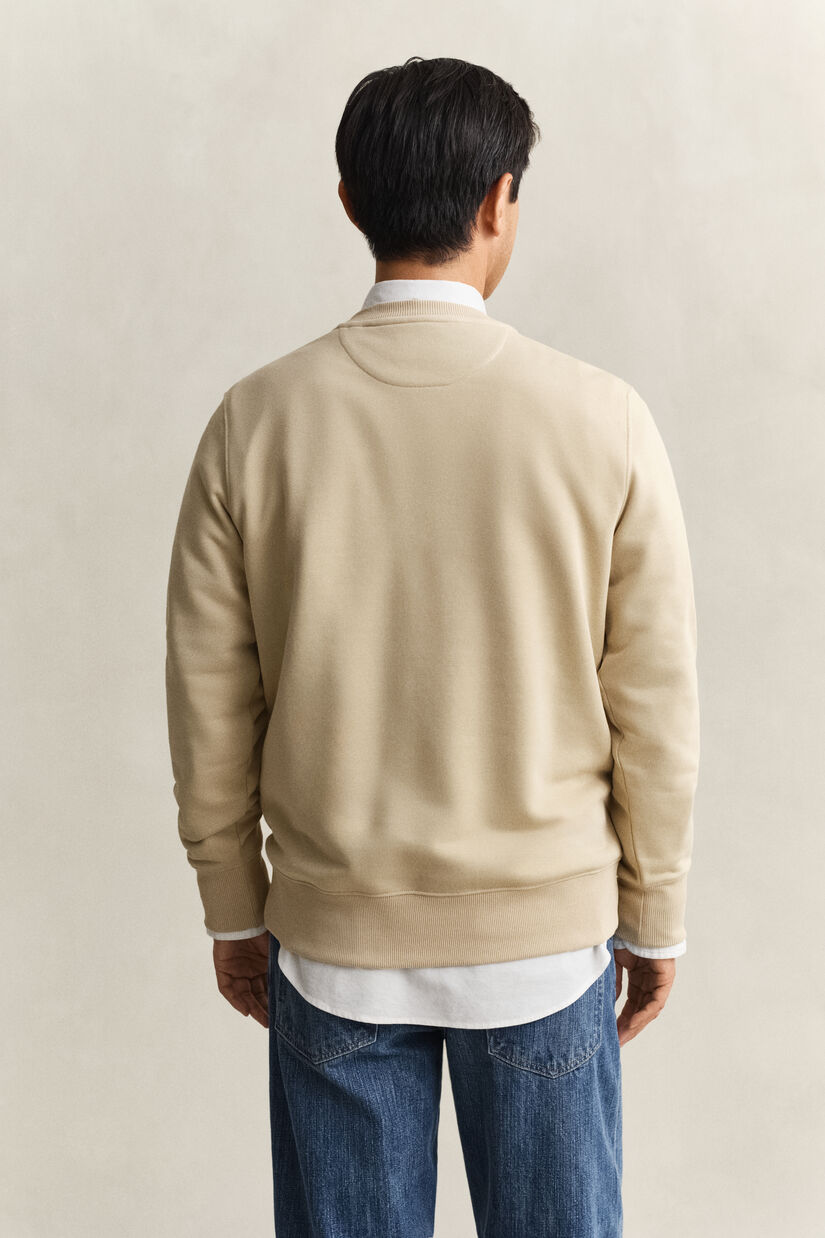 Sweat-shirt col rond avec &eacute;cusson