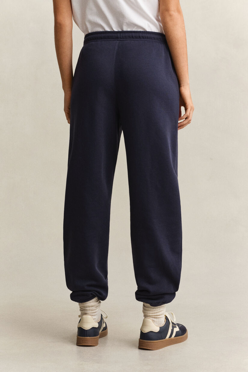 Pantalon de jogging avec &eacute;cusson ton sur ton