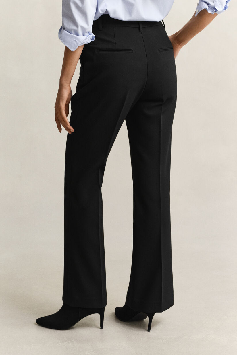 Pantalon coupe slim &eacute;vas&eacute;