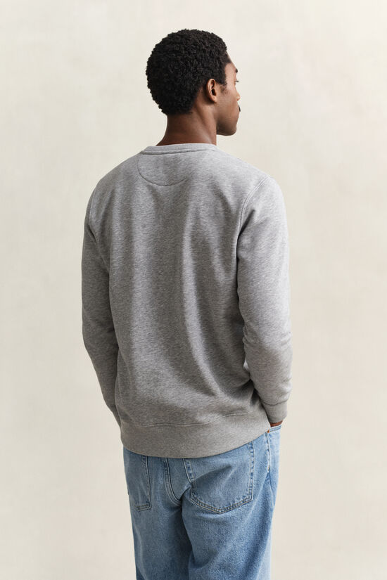 Sweat-shirt col rond avec &eacute;cusson