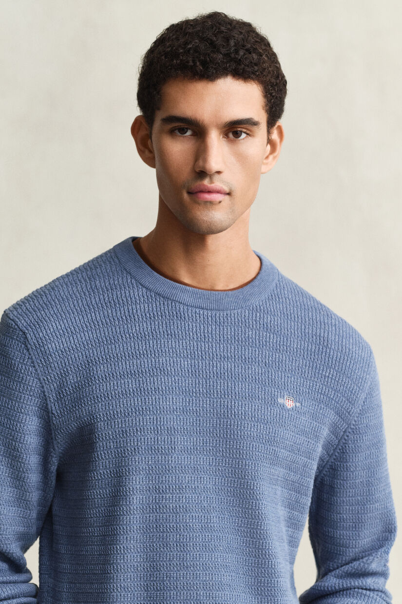 Pull col rond en maille torsad&eacute;e