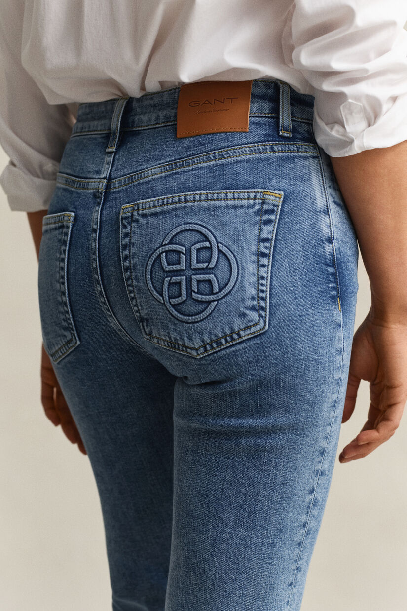 Jean &eacute;vas&eacute; avec monogramme