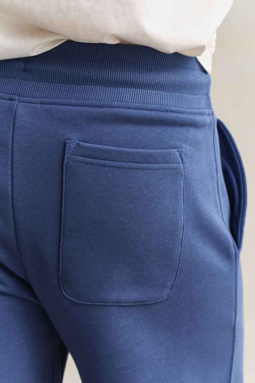 Pantalon de jogging avec &eacute;cusson