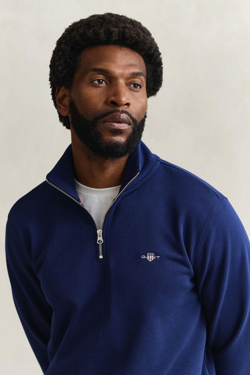 Sweat-shirt &agrave; demi-zip avec &eacute;cusson