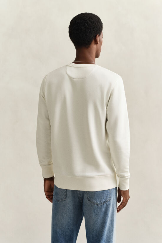 Sweat-shirt col rond avec &eacute;cusson