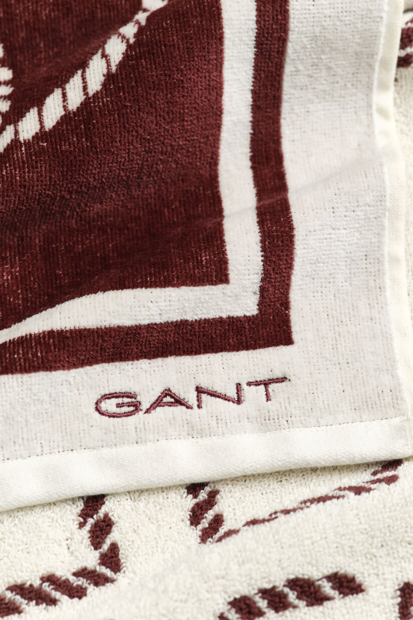 Serviette de plage &agrave; monogrammes imprim&eacute;s