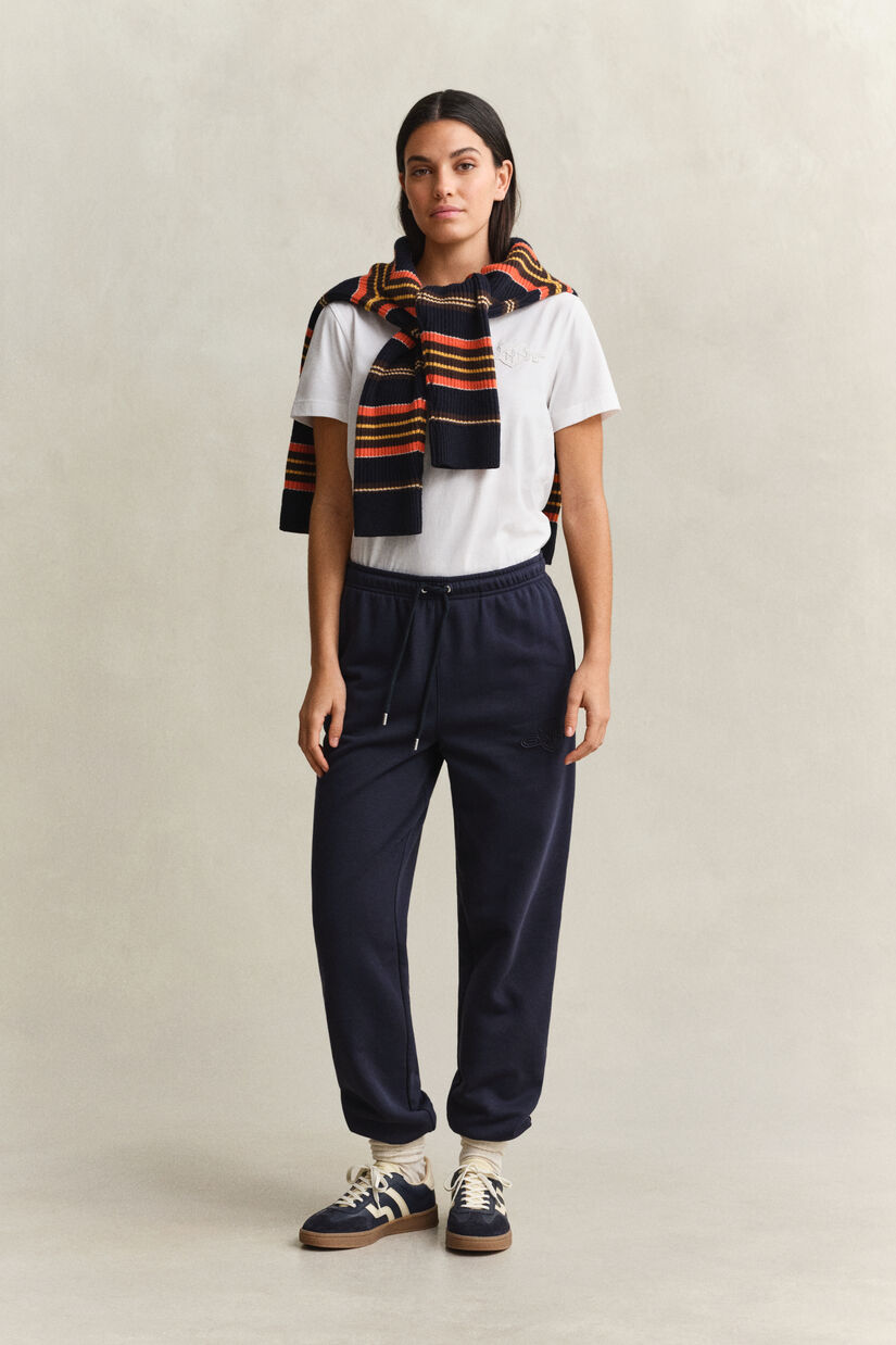 Pantalon de jogging avec &eacute;cusson ton sur ton
