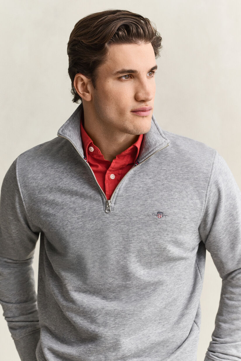 Sweat-shirt &agrave; demi-zip avec &eacute;cusson