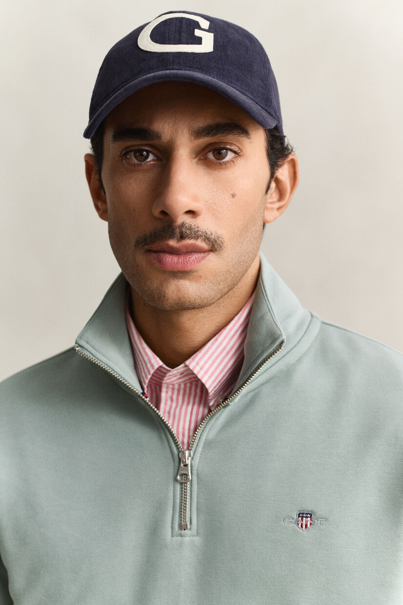 Sweat-shirt &agrave; demi-zip avec &eacute;cusson