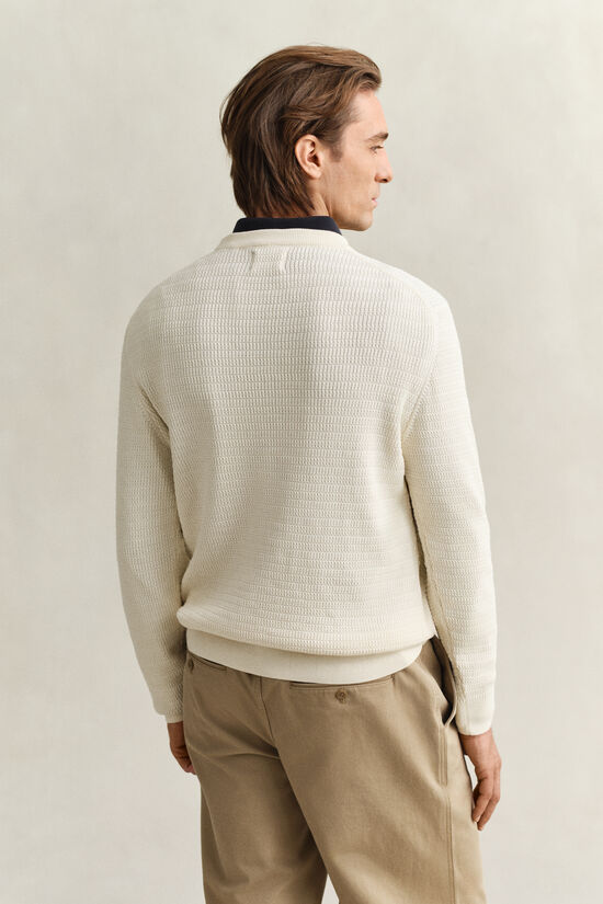 Pull col rond en maille torsad&eacute;e