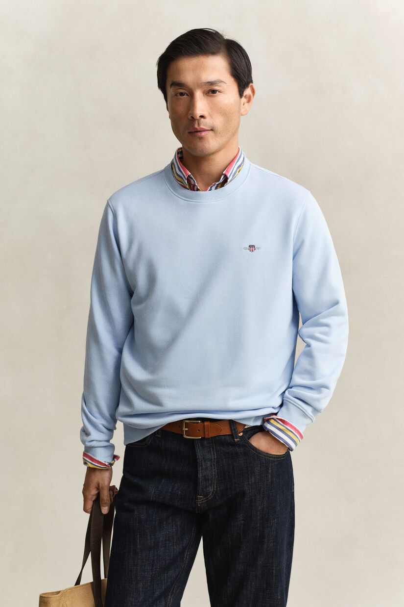 Sweat-shirt col rond avec &eacute;cusson