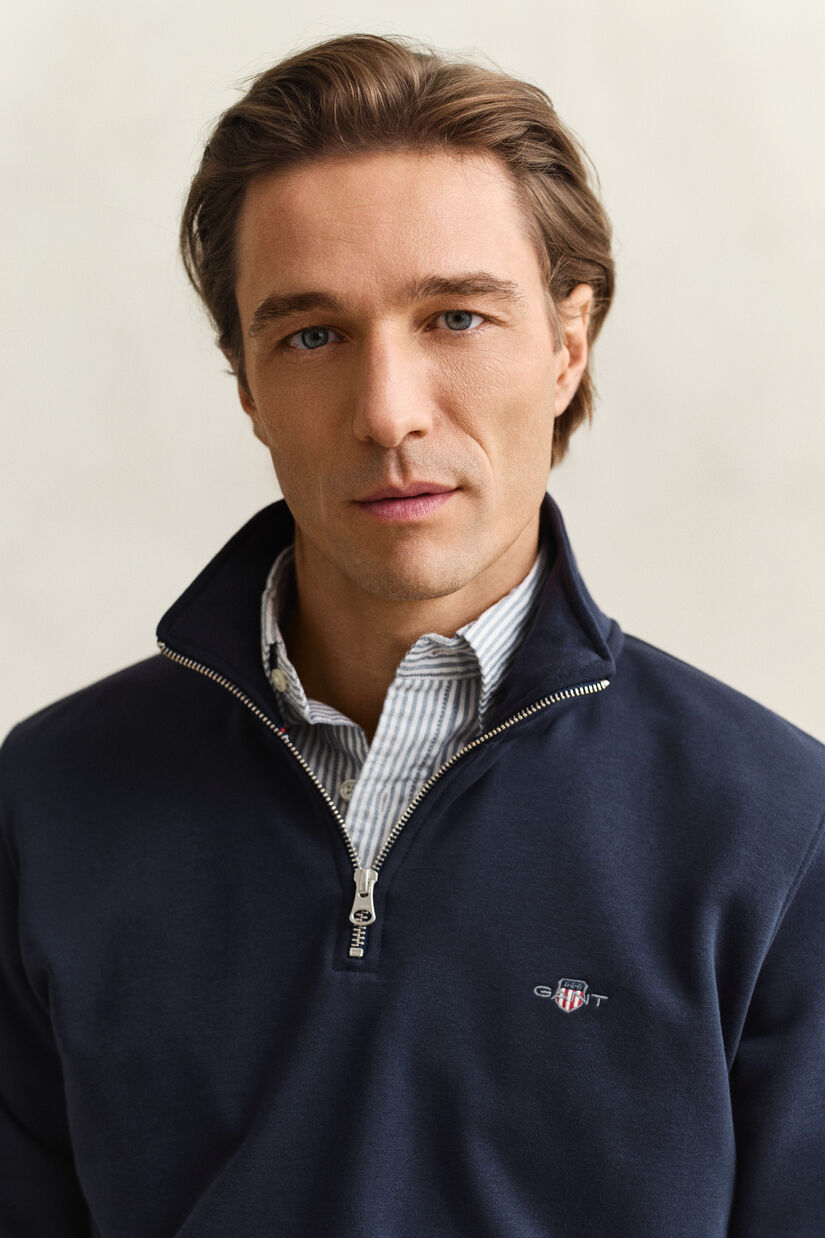 Sweat-shirt &agrave; demi-zip avec &eacute;cusson