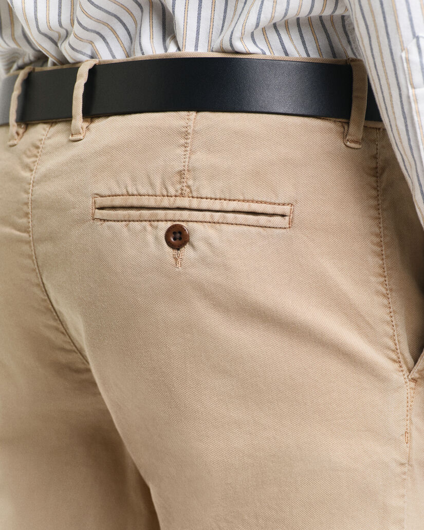 Pantalon chino slim fit en tissu armur&eacute; Structured