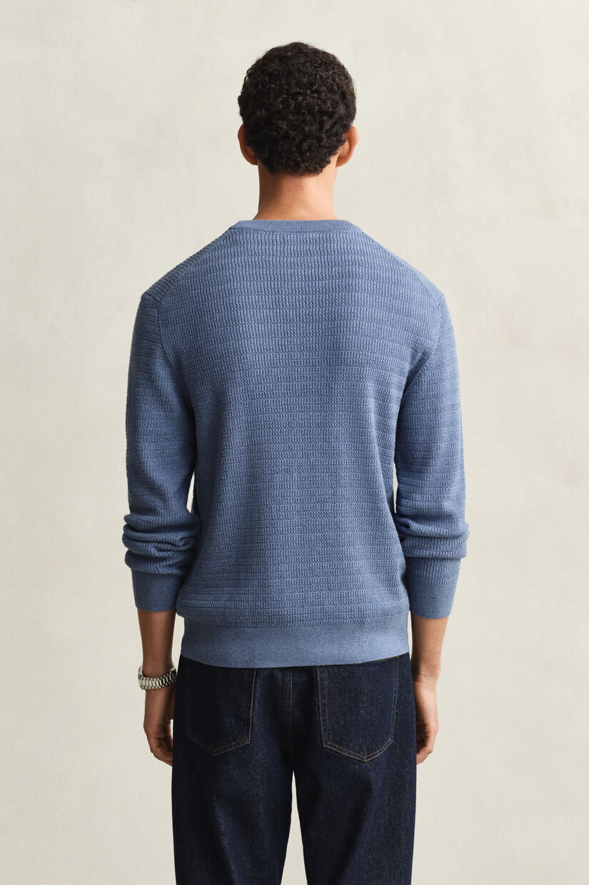 Pull col rond en maille torsad&eacute;e