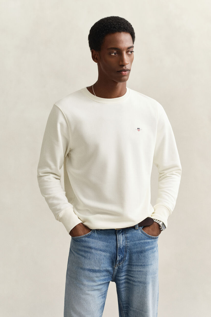 Sweat-shirt col rond avec &eacute;cusson