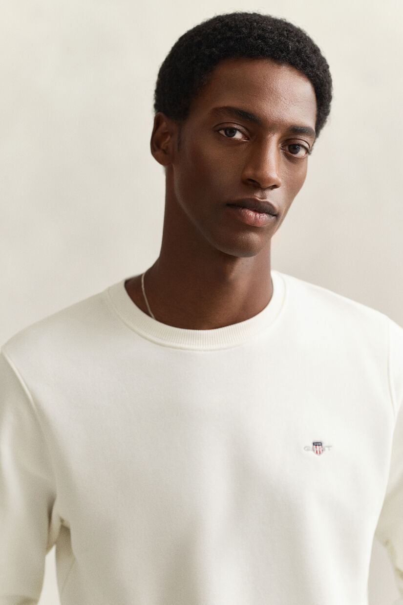 Sweat-shirt col rond avec &eacute;cusson