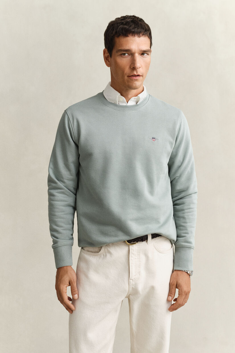 Sweat-shirt col rond avec &eacute;cusson