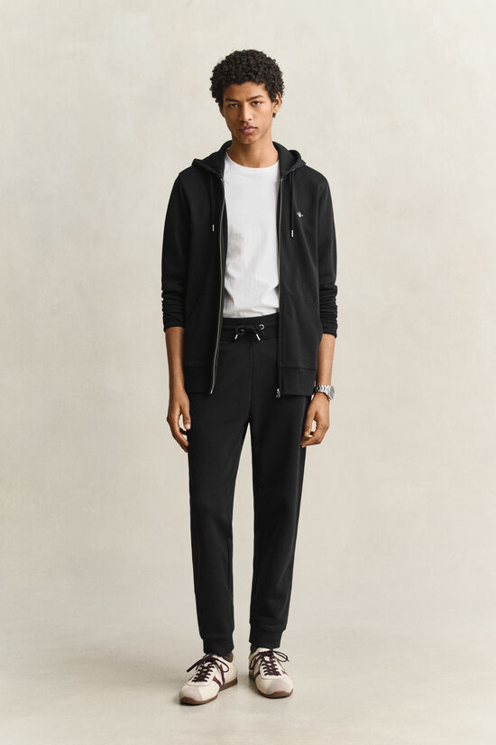 Pantalon de jogging avec &eacute;cusson