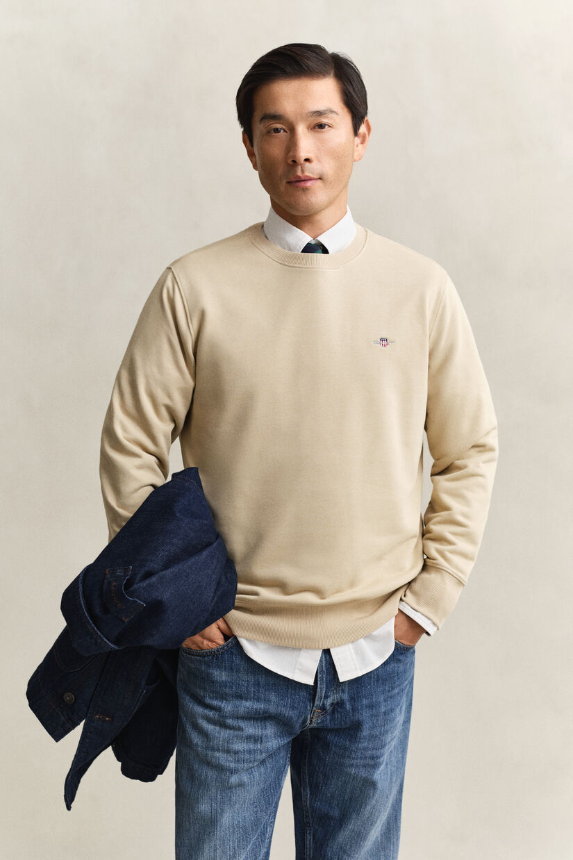 Sweat-shirt col rond avec &eacute;cusson