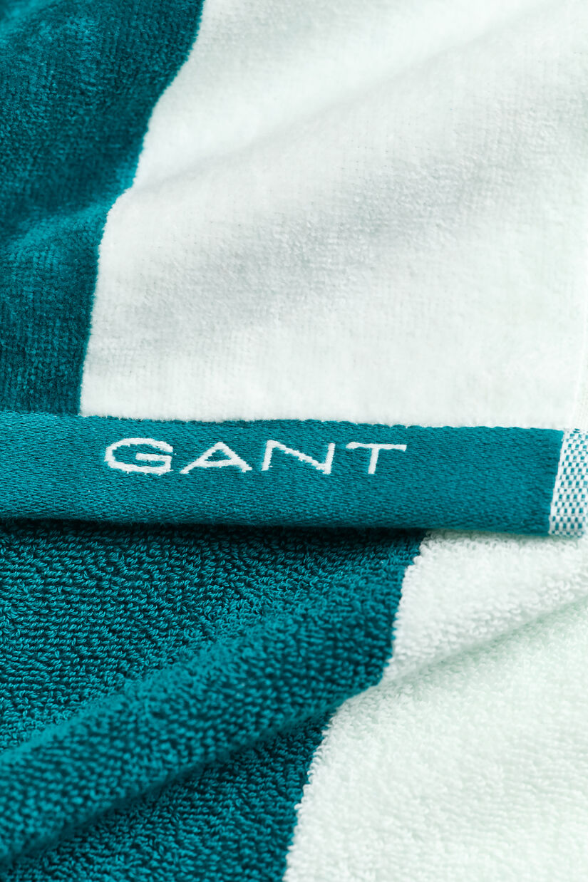 Serviette de plage &agrave; rayures &eacute;clatantes