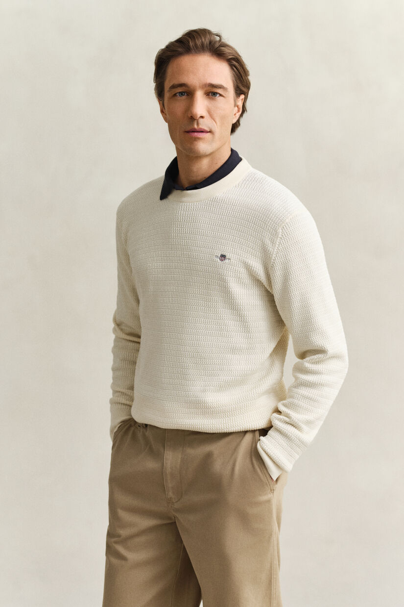 Pull col rond en maille torsad&eacute;e
