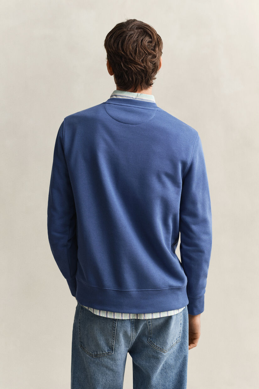 Sweat-shirt col rond avec &eacute;cusson