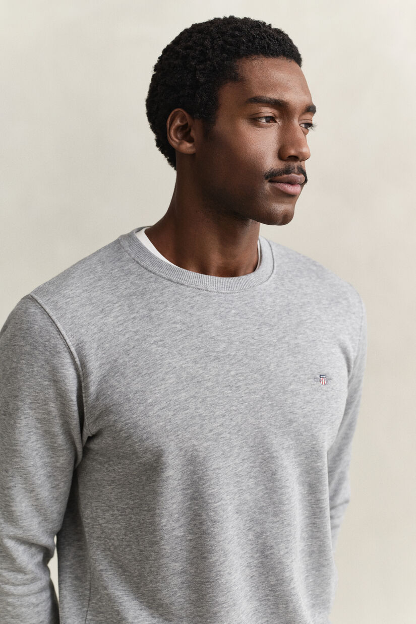 Sweat-shirt col rond avec &eacute;cusson