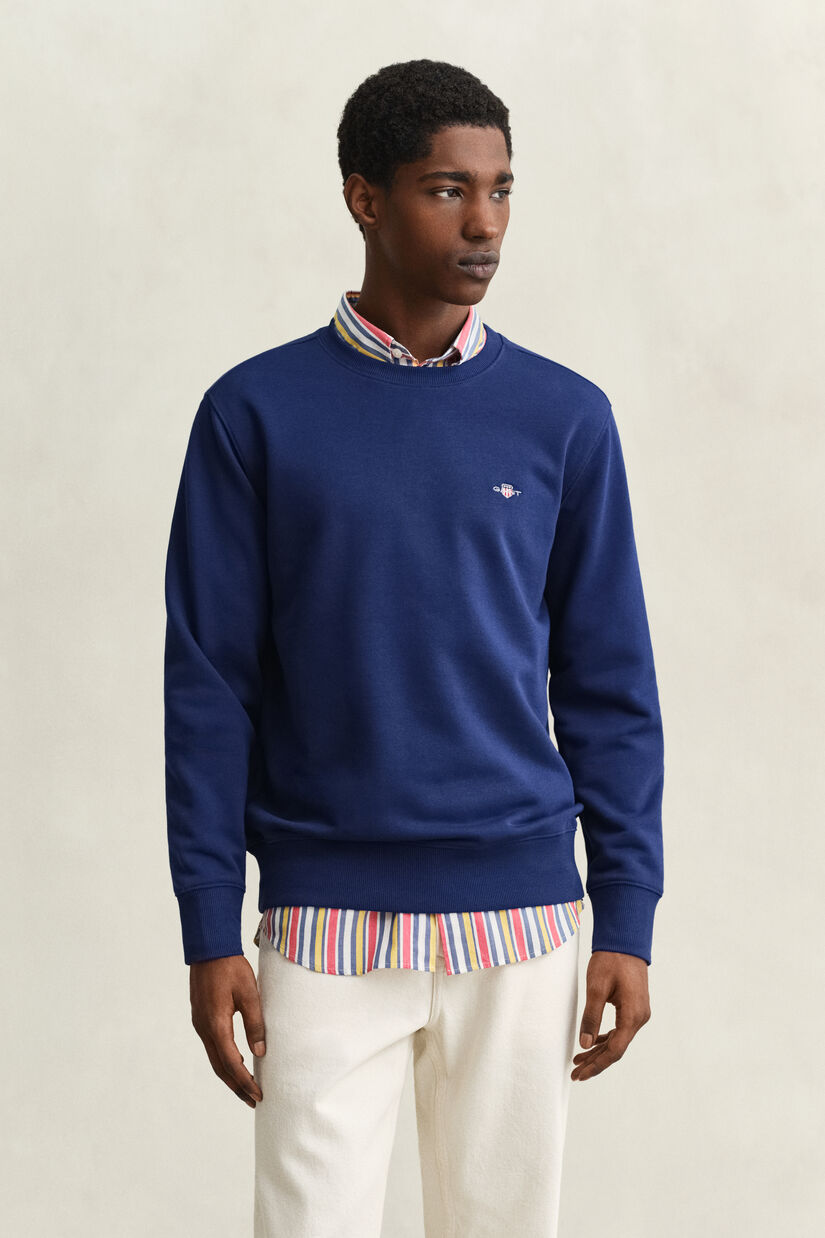 Sweat-shirt col rond avec &eacute;cusson
