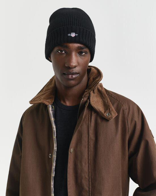 Bonnet en laine avec &eacute;cusson