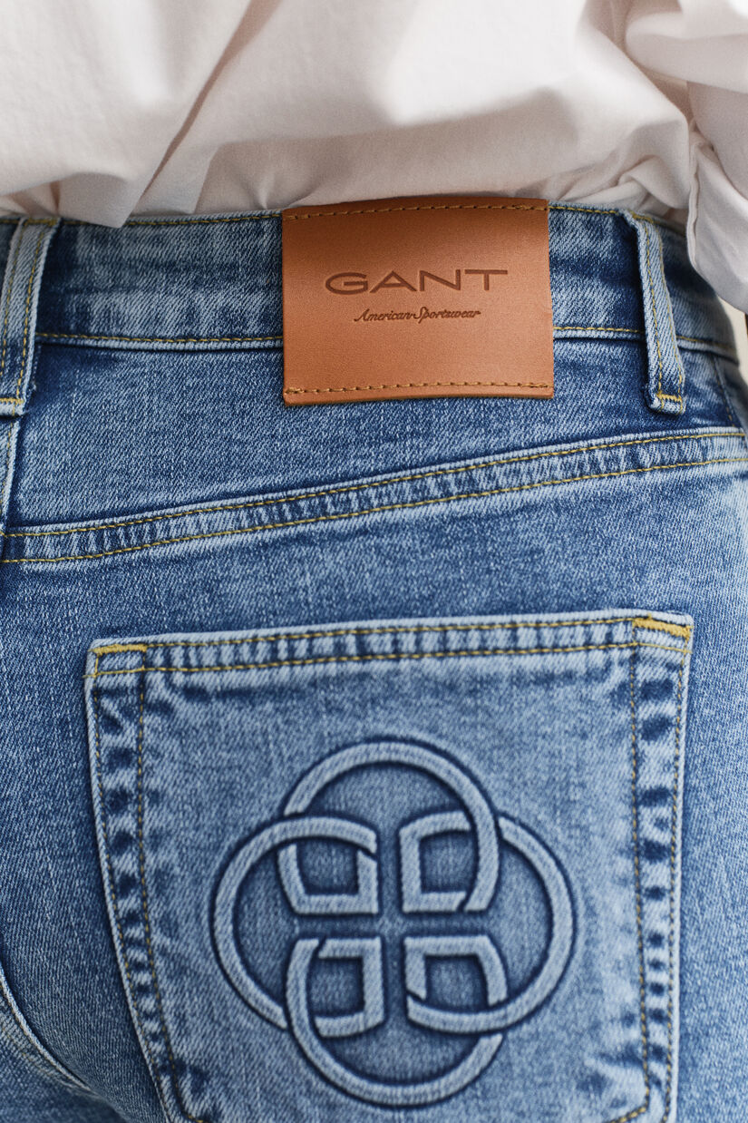 Jean &eacute;vas&eacute; avec monogramme