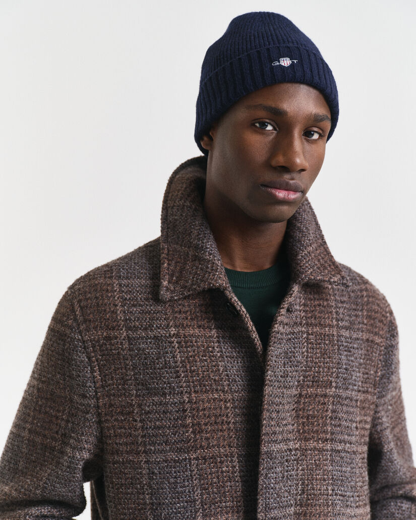 Bonnet en laine avec &eacute;cusson