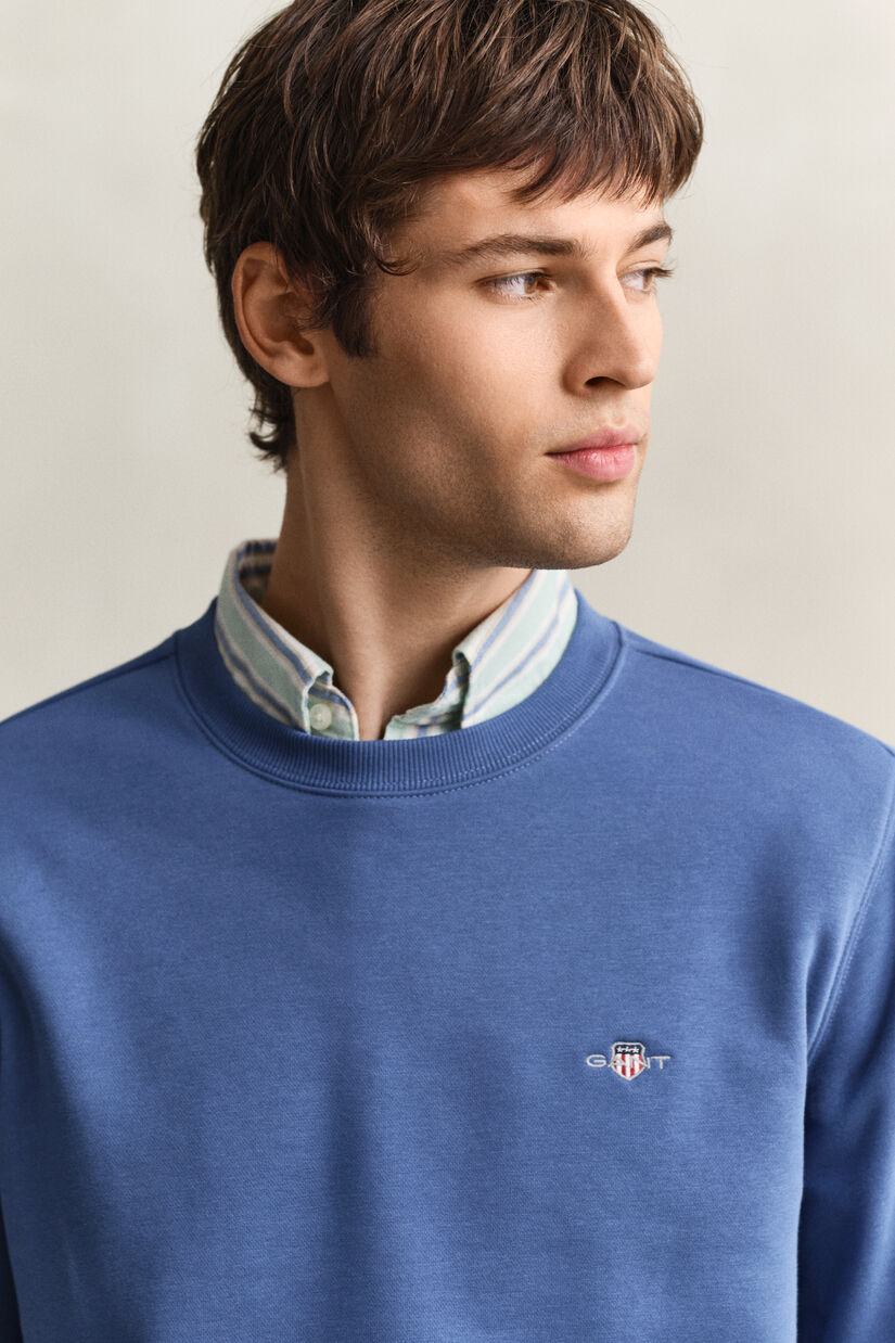 Sweat-shirt col rond avec &eacute;cusson