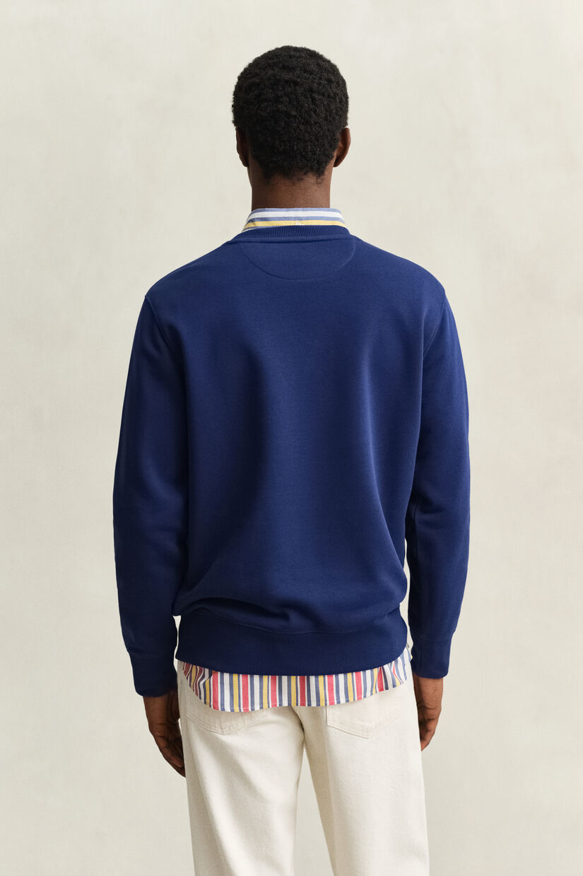 Sweat-shirt col rond avec &eacute;cusson