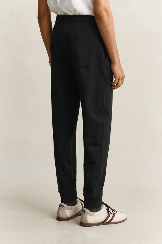 Pantalon de jogging avec &eacute;cusson