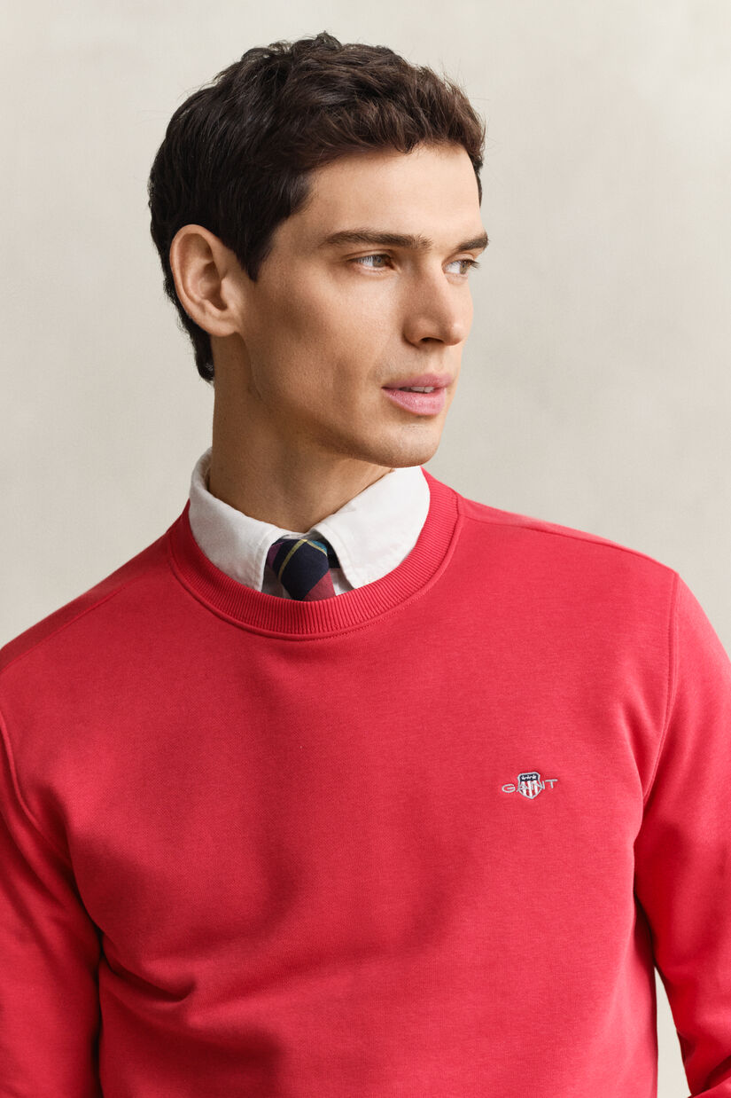 Sweat-shirt col rond avec &eacute;cusson