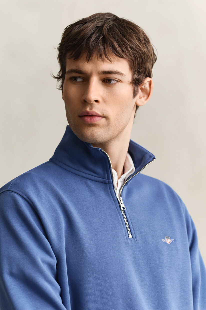 Sweat-shirt &agrave; demi-zip avec &eacute;cusson