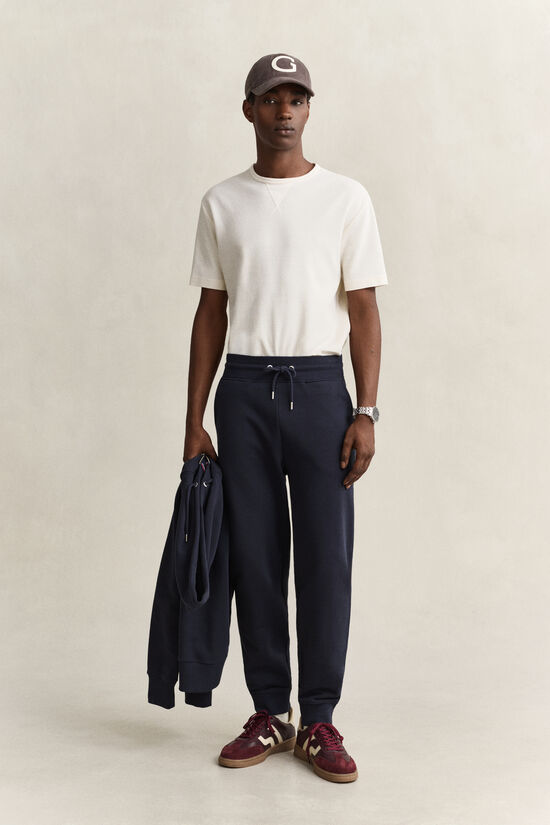 Pantalon de jogging avec &eacute;cusson